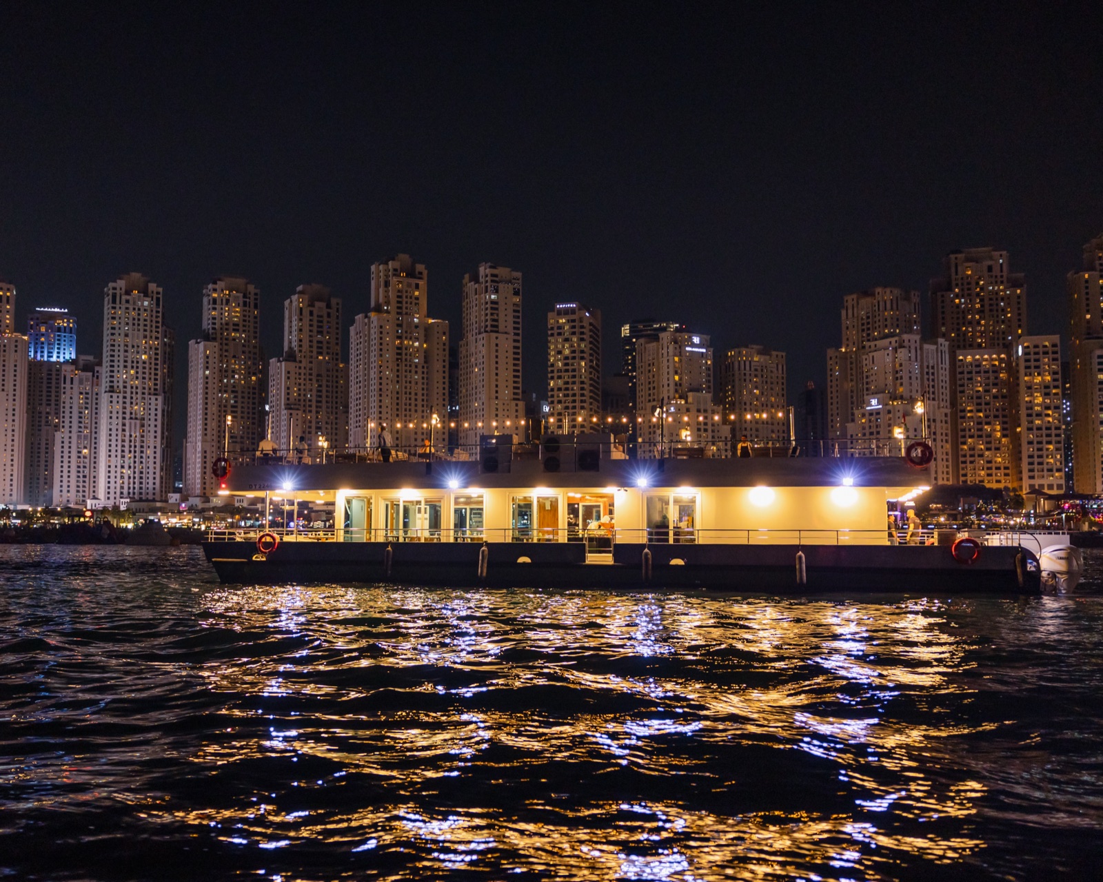 Alexandra Sea Lounge gliding past JBR Beach skyline